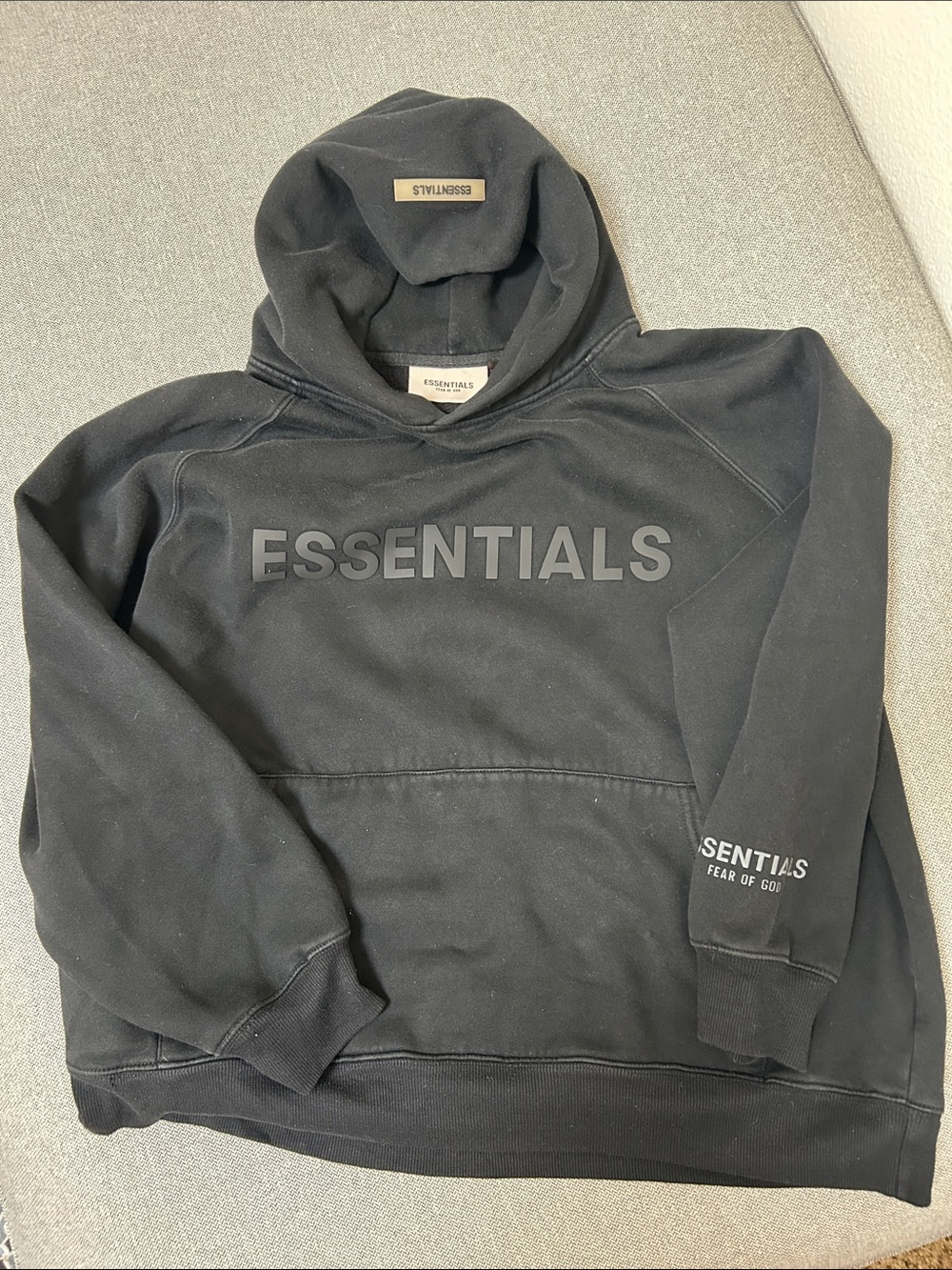 Fear of God ESSENTIALS Black Embossed Logo Hoodie